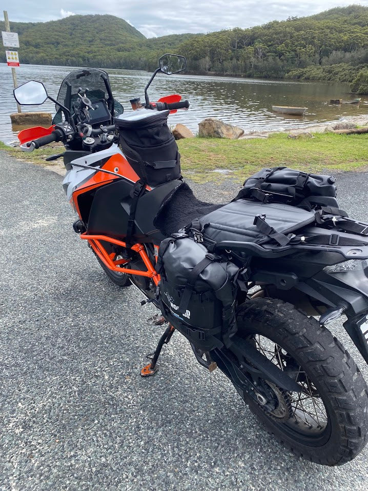 Adventure bike stopped near the hills