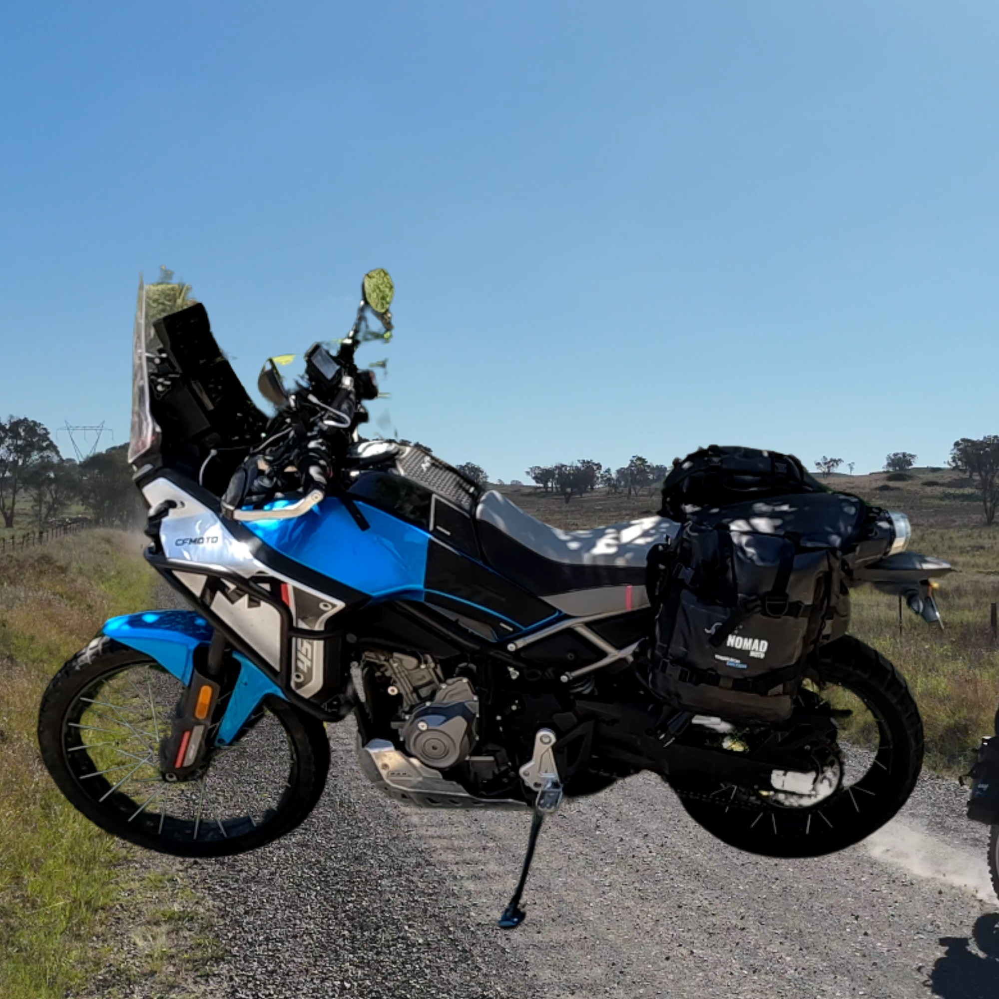 Blue bike with rackless waterproof bag