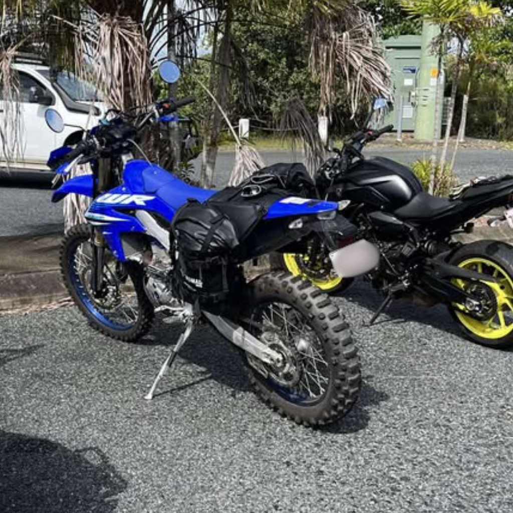 ADV bikes with panniers in the parking area